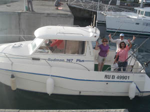 Photo du bateau Fishing Party passant les balises au départ.